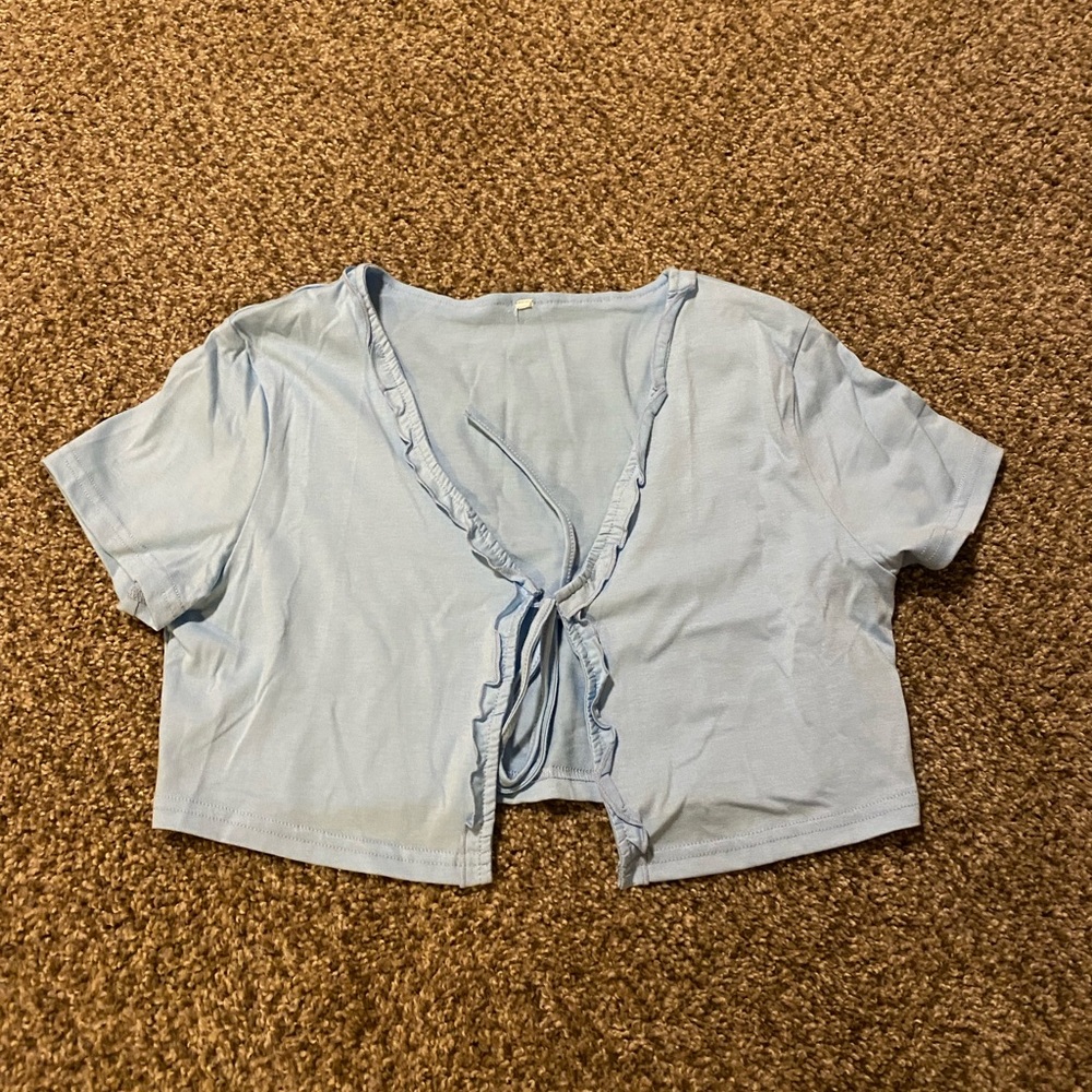 Light blue tie in front crop top. Size XS/S